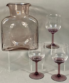 A Blenko Amethyst Carafe and Three Fostoria Amethy
