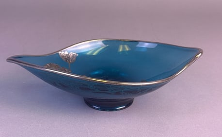 A Tiffin Teal Blue Art Glass Bowl with Silver Over