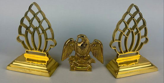 A Trio of Decorative Crafts Inc. Federal Revival Brass-Tone Bookends and Eagle Figure