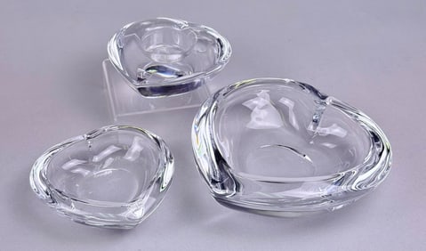 A Trio of Orrefors Amour Crystal Heart Dishes and Votive Holder
