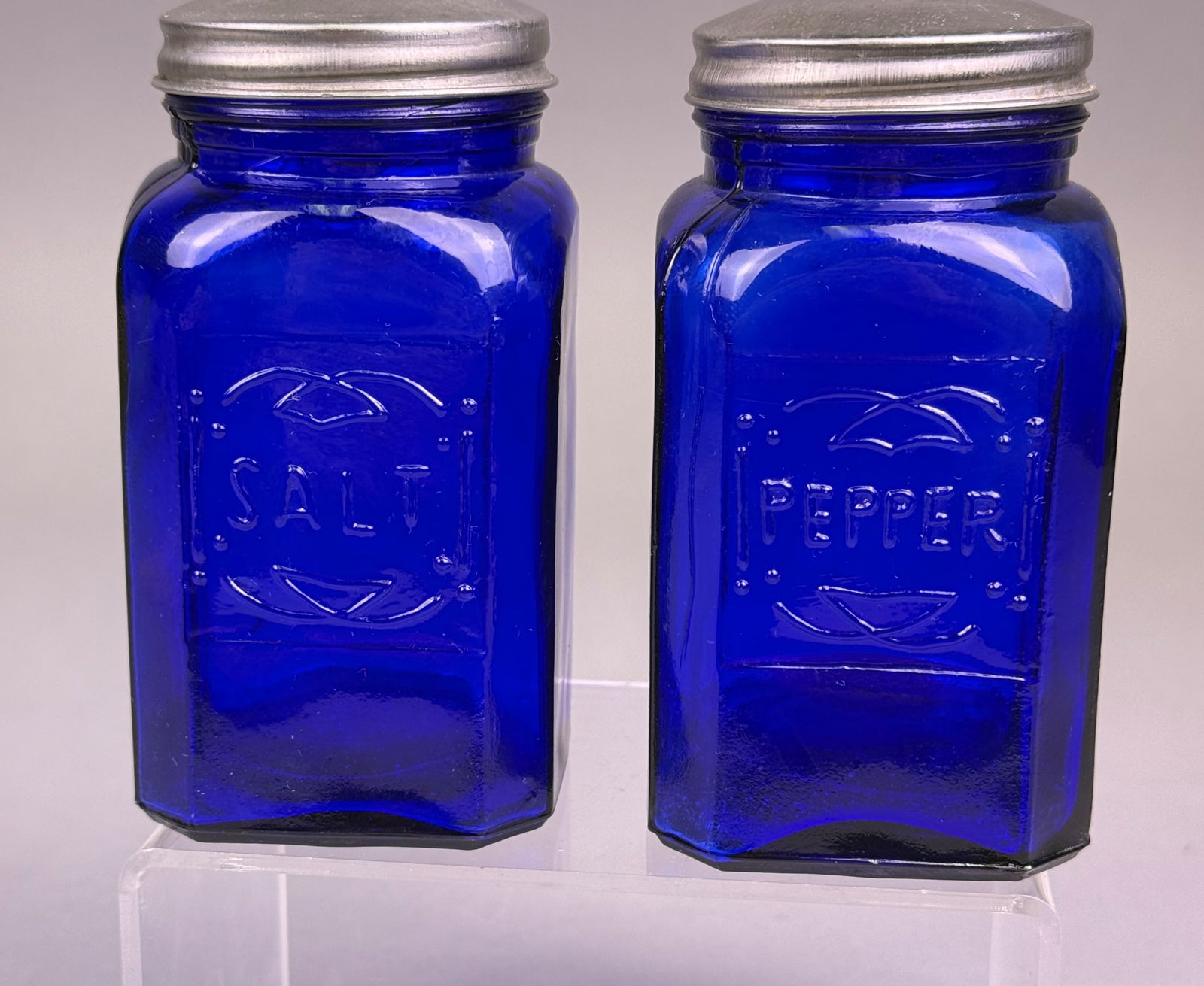A Pair of Cobalt Blue Glass Depression Style Salt and Pepper Shakers (1 of 6)