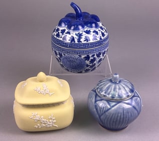 A Trio of Covered Ceramic Jars Including Wedgwood Jasperware and Thai Celadon