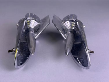 A Pair of 1957 Chevy Hood Rockets