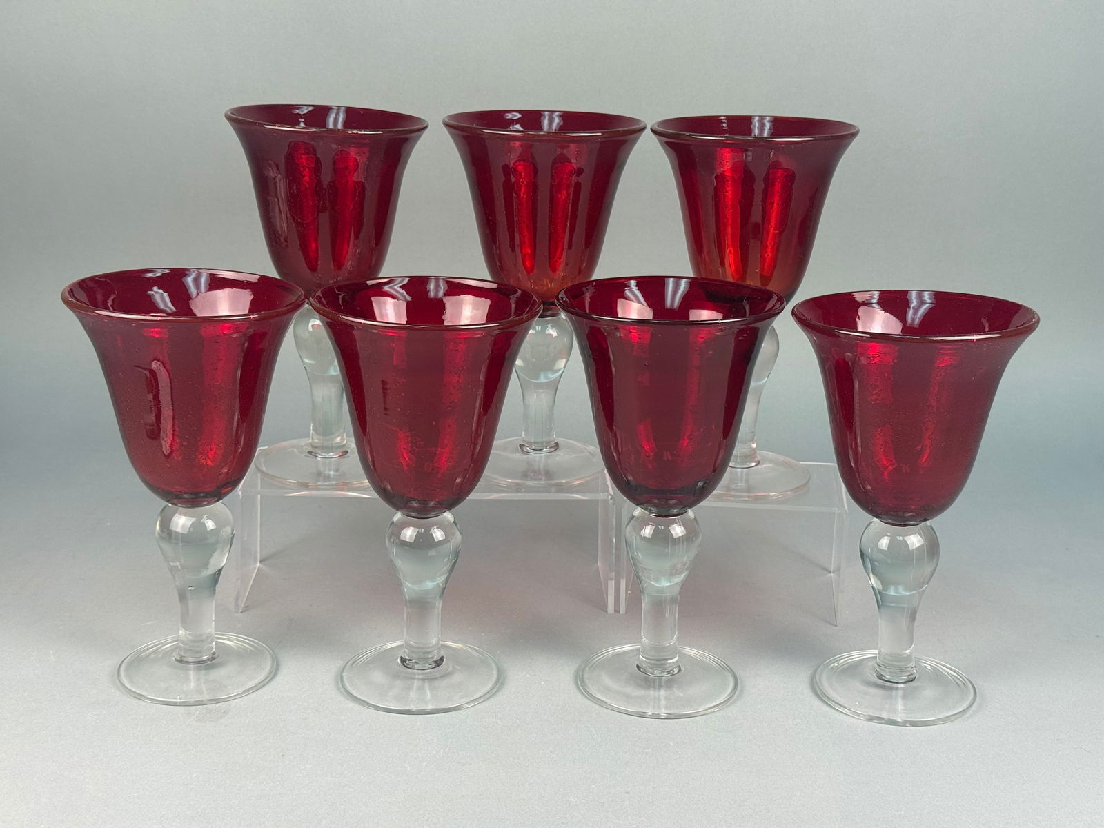 A Set of Seven Hand-Blown Ruby Red Glass Goblets with Clear Stems (1 of 5)