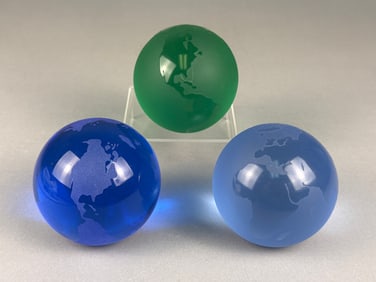 Three Contemporary Etched World Globe Paperweights, Glass or Crystal