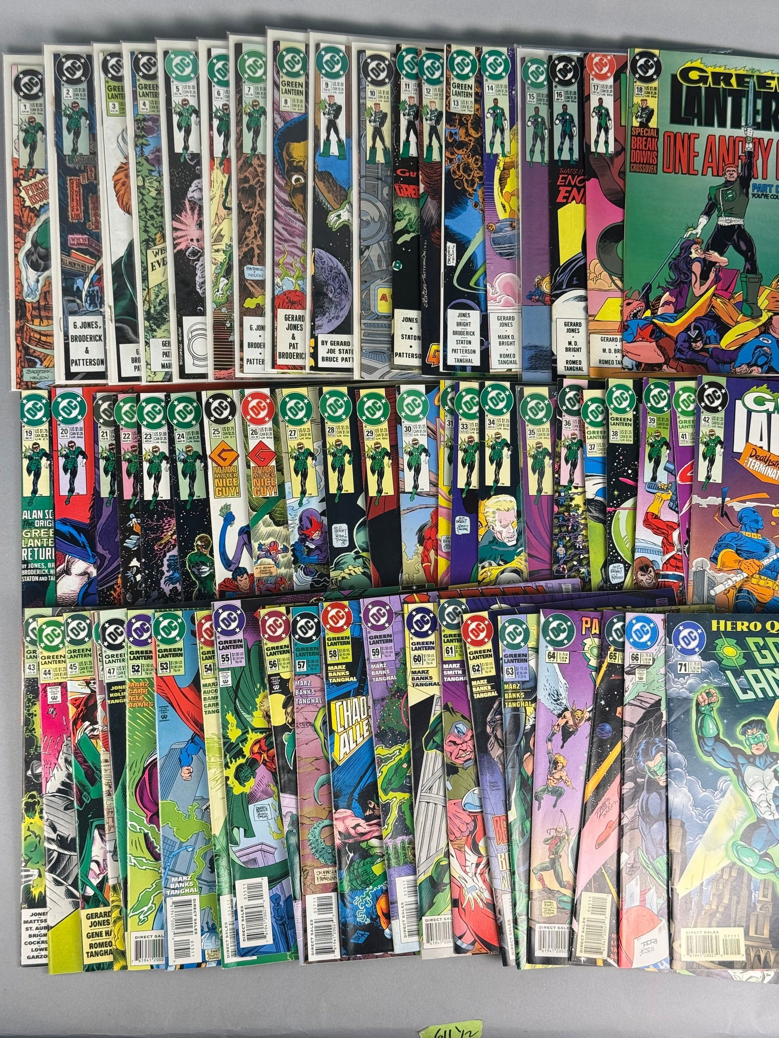 A Collection of DC Comics Green Lantern, Vol. 3, Issues #1-71: A collection of DC Comics "Green Lantern" comic books, specifically a large run from Volume 3, spanning issues #1-39, 41-47, 52-66, 71 Reader copies with light ti moderate wrinkles, spine c