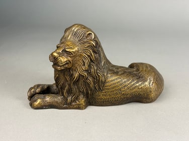 A Cast Brass Recumbent Lion Sculpture, 19th/20th Century