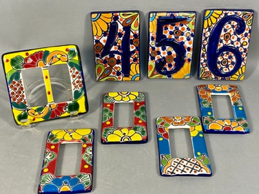A Collection of 8 Mexican Talavera Pottery Switch Plates and House Number Tiles
