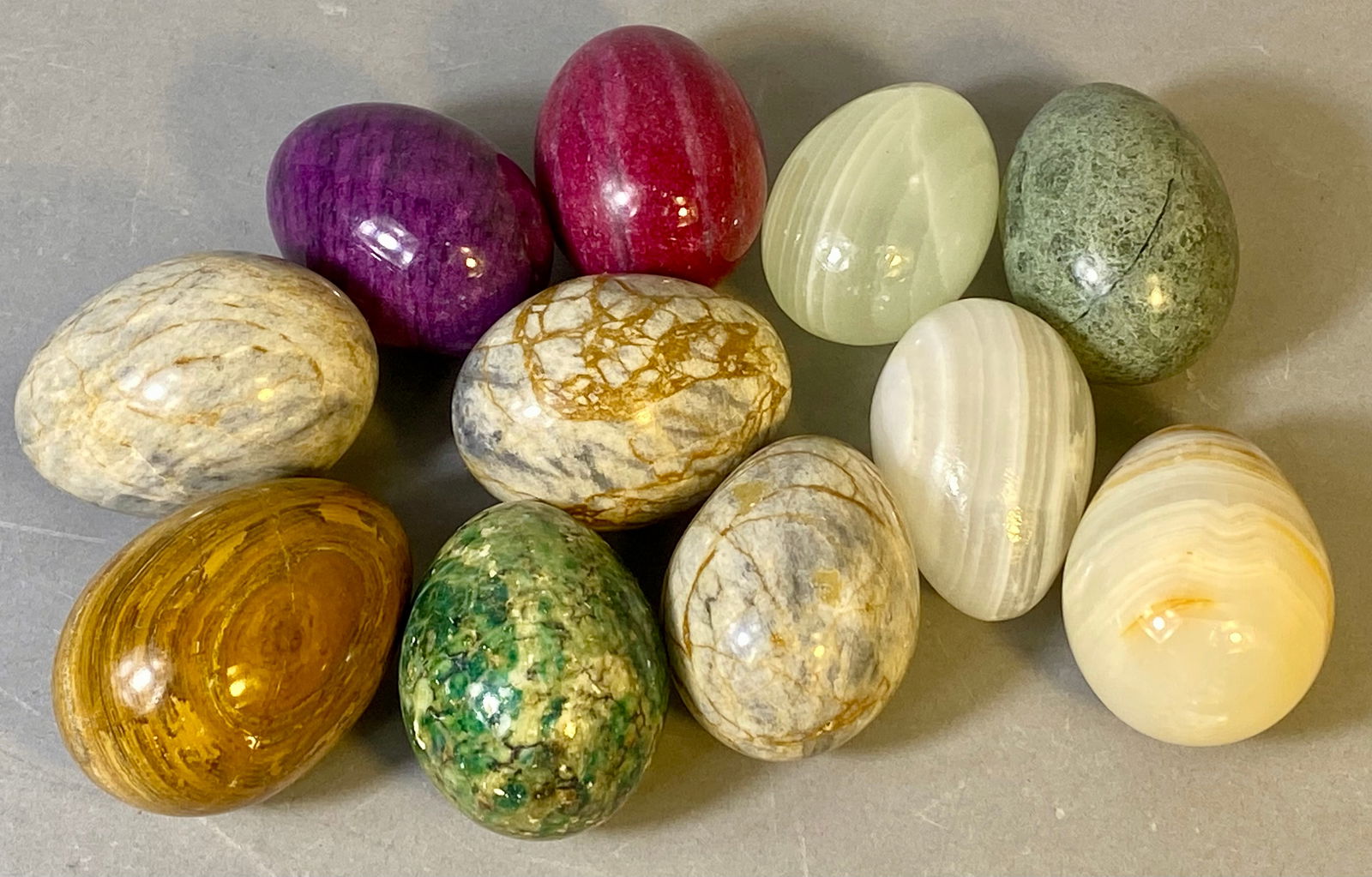 A Collection of 11 Polished Hard Stone and Semi-Precious Decorative Eggs (1 of 4)