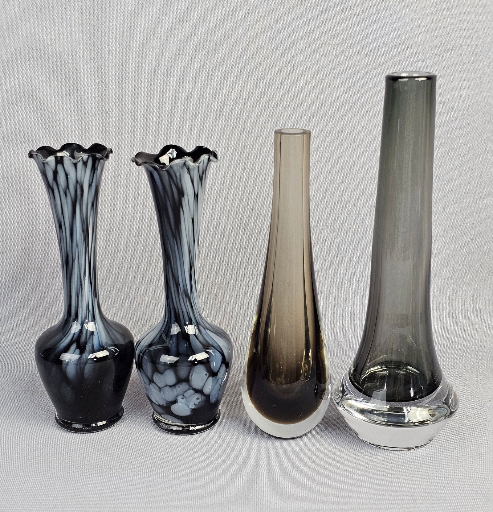 A Collection of Four Black Glass Vases (1 of 12)