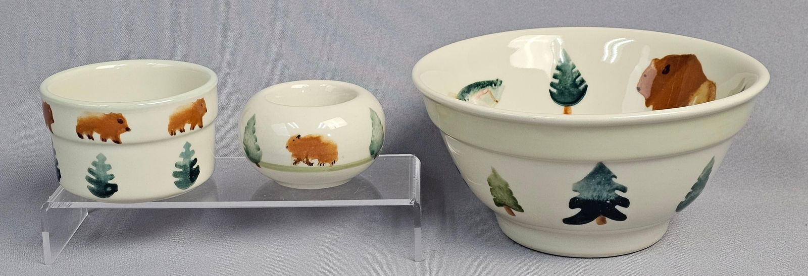 A Trio of Balsam Lane Stoneware Items by Hartstone USA: A trio of glazed stoneware ceramic items produced by Hartstone USA in the Lenox Balsam Lane pattern. The collection includes one large mixing or serving bowl, one cylindrical ramekin or small cup, and