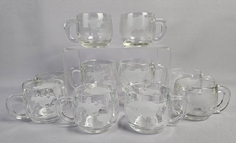A Collection of 10 Nestl?© Nescafe Frosted Globe Glass Mugs