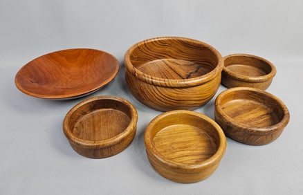 A Collection of Six Assorted Wooden Serving Vessels, Including a Teakwood Bowl Set