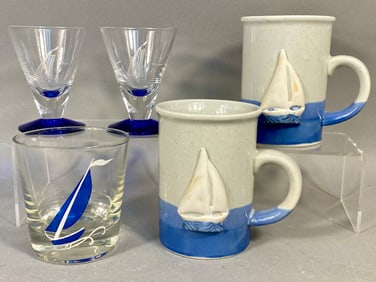 A Collection of Five Nautical Drinking Vessels including Otagiri Sailboat Mugs
