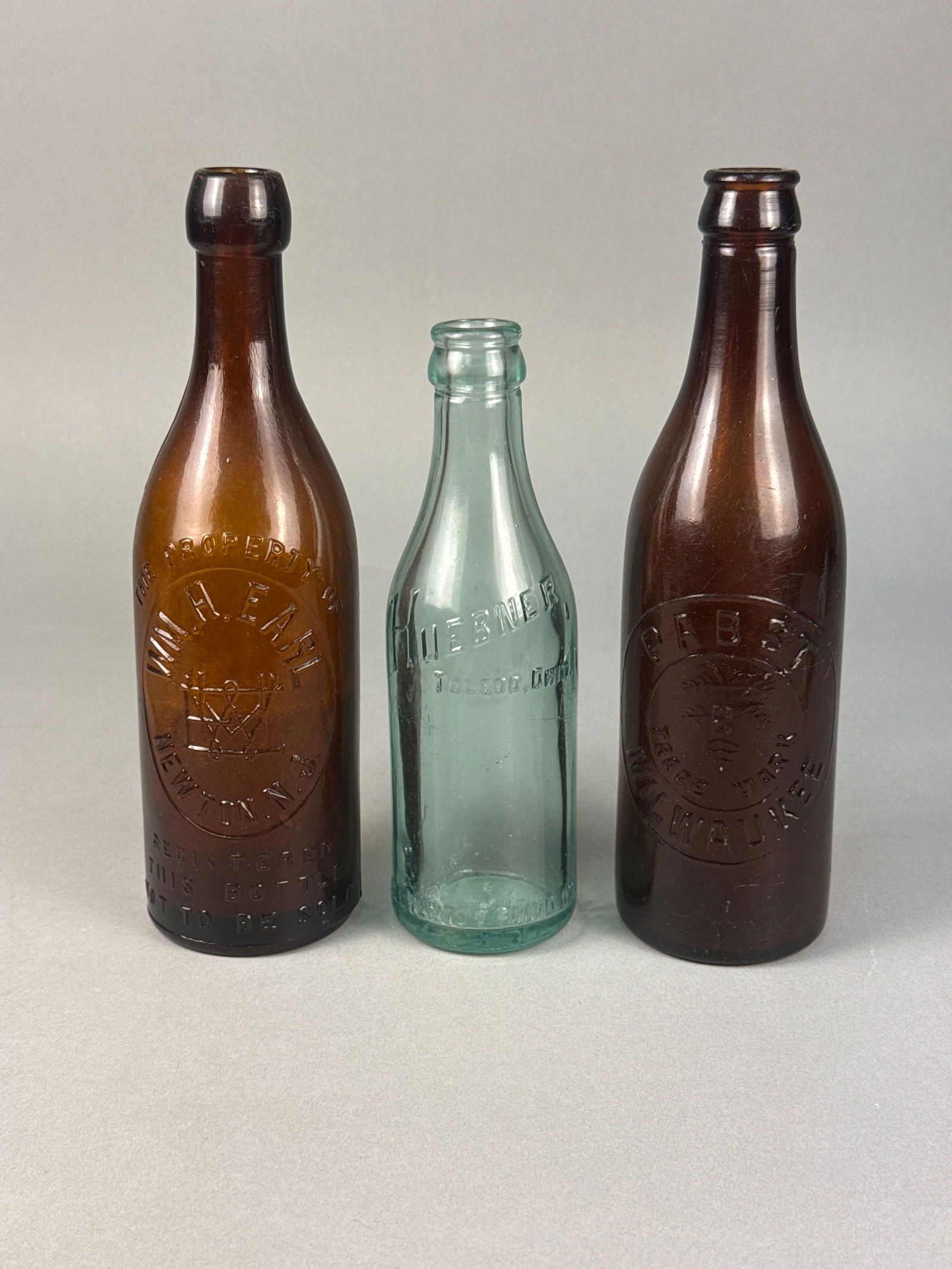 A Trio of Antique Embossed Glass Beer Bottles Pabst (1 of 7)