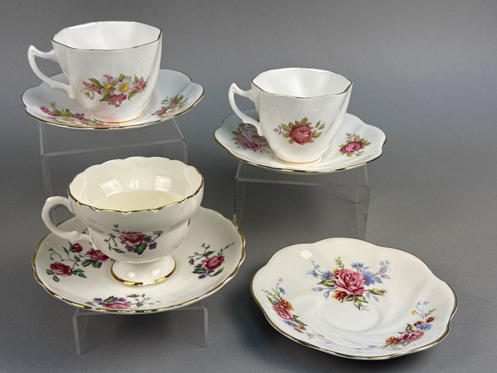 A Mixed Collection of English Bone China Teacups and Saucers (1 of 8)