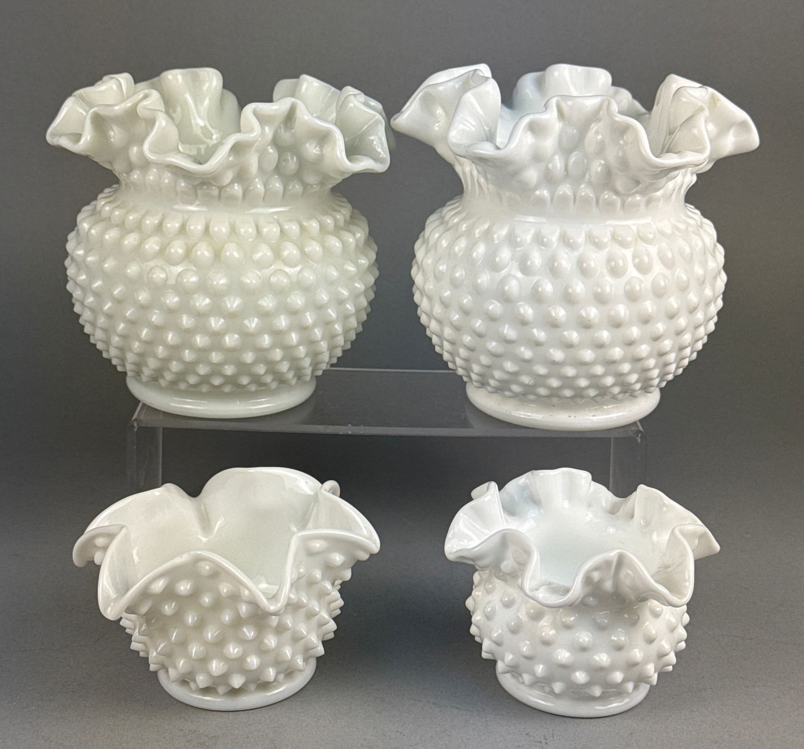 A Collection of Four White Milk Glass Hobnail Ruffled Edge Vessels (1 of 4)