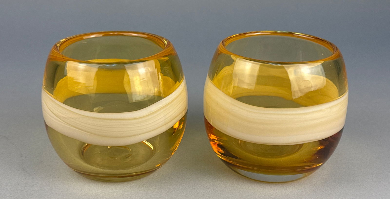 A Pair of Amber and Cream Art Glass Votive Candle Holders (1 of 8)