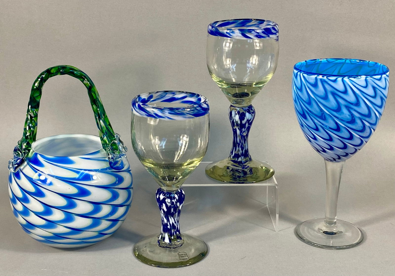 A Collection of Hand-Blown Blue Swirl Glass Items (1 of 8)