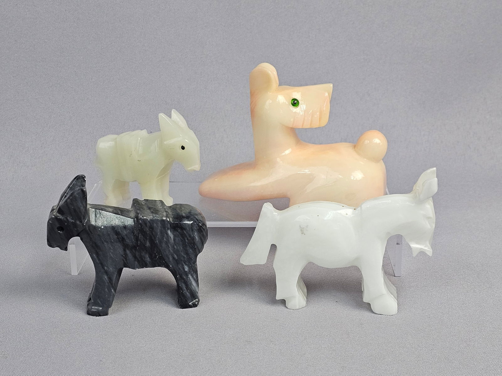 A Group of Carved Alabaster and Onyx Donkey and Dog Figurines (1 of 13)