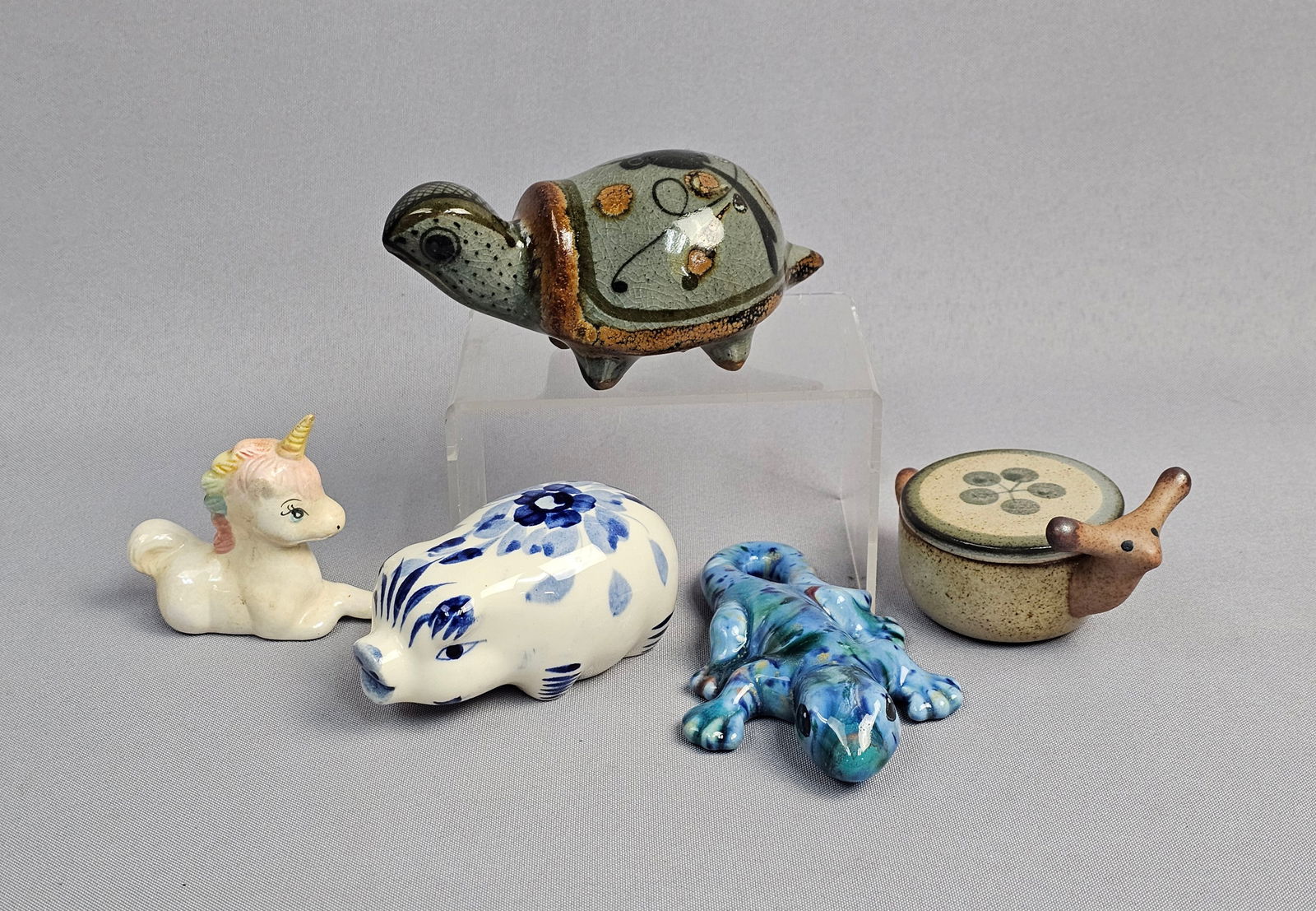 A Collection of Ceramic Figurines Including Noe Suro Pig Figurine (1 of 19)