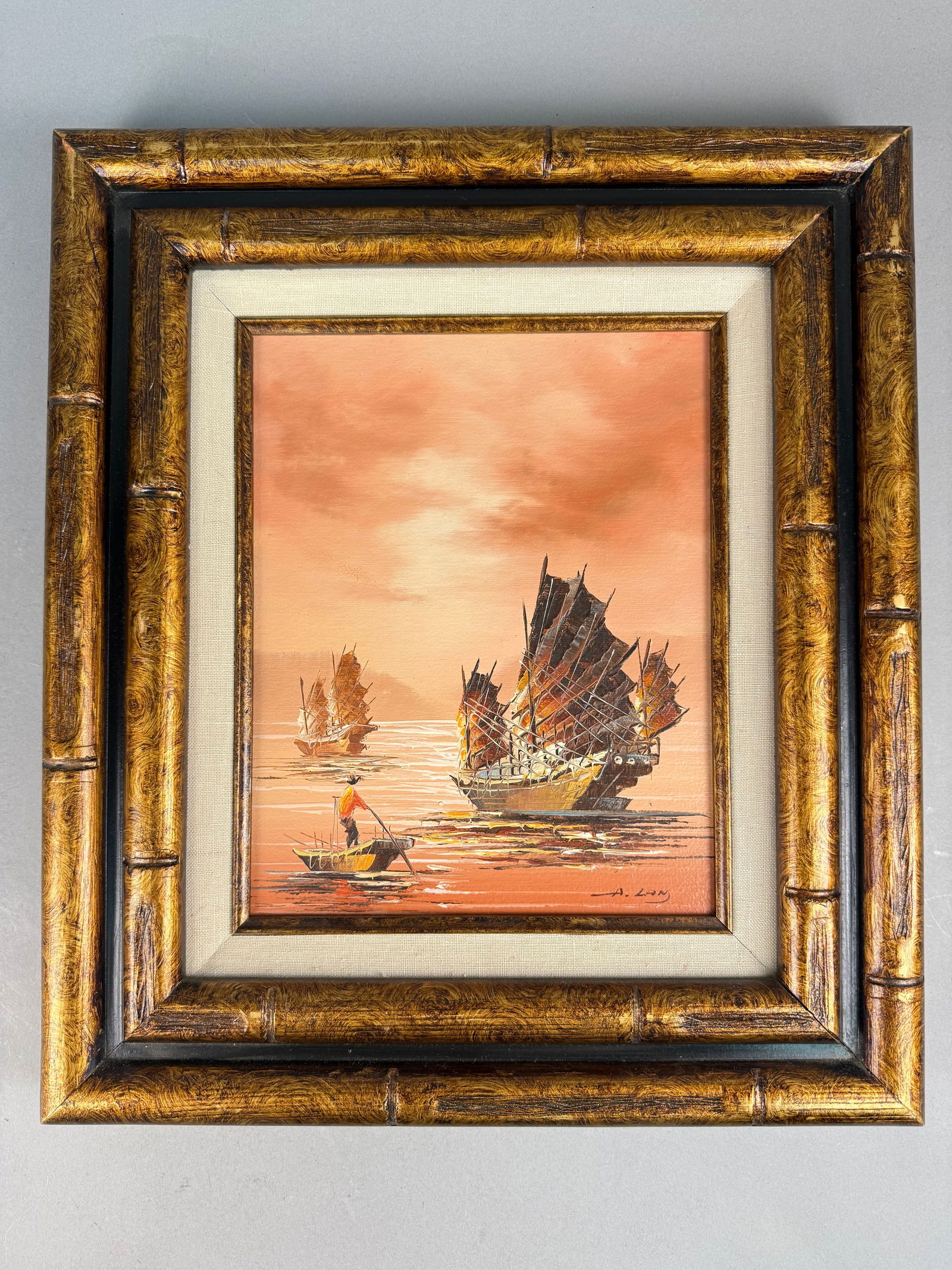 Mid Century Modern Chinese Junk Boat Oil Painting Signed A. Lon: This mid-century modern oil painting on board depicts Chinese junk ships at sunset. The work features a heavy impasto technique in the rendering of the vessels, set against a soft, blended peach and o