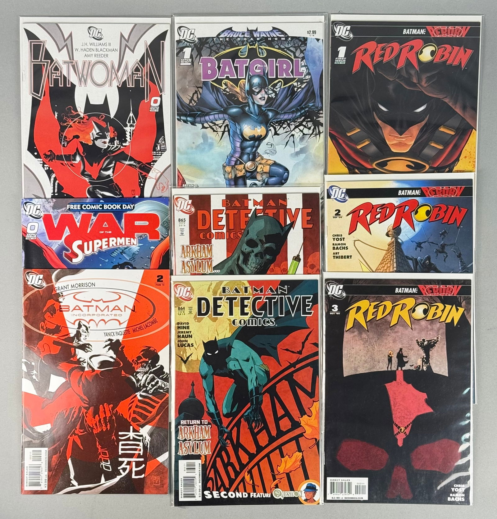 A Collection of DC Comics Batman Universe Titles: A collection of DC Comics modern-age comic books primarily focusing on characters within the Batman universe. The group includes titles such as Batwoman, Batgirl, Red Robin, Detective Comics, Batman I