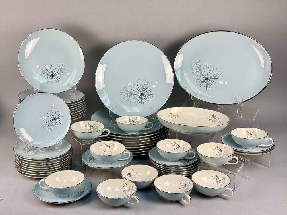 A Collection of Franciscan Masterpiece China Silver Pine Dinnerware: A collection of Franciscan Masterpiece China fine china dinnerware in the Silver Pine pattern, manufactured by Gladding, McBean and Co. in the USA. The set features a light blue exterior ground with c