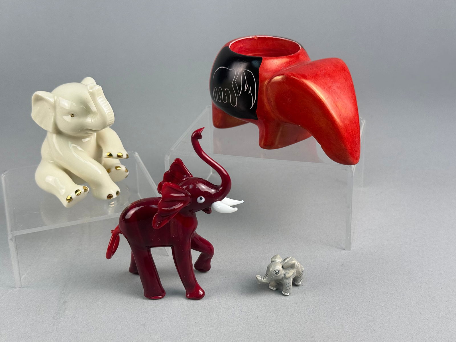 A Collection of Murano, Lenox, and Soapstone Elephant Figurines (1 of 7)