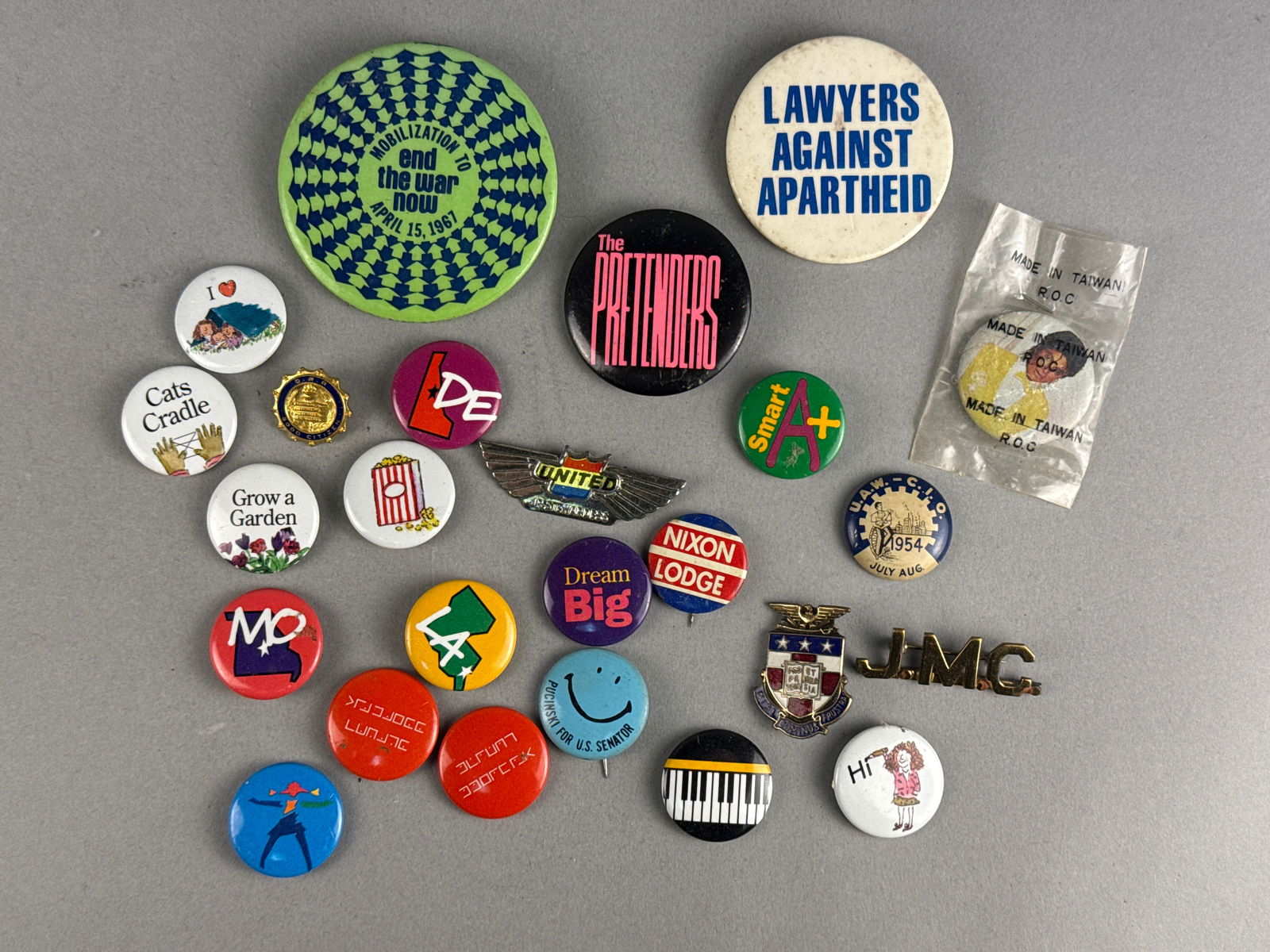 A Collection of Vintage Political Social Protest and Thematic Pinback Buttons and Badges including (1 of 7)