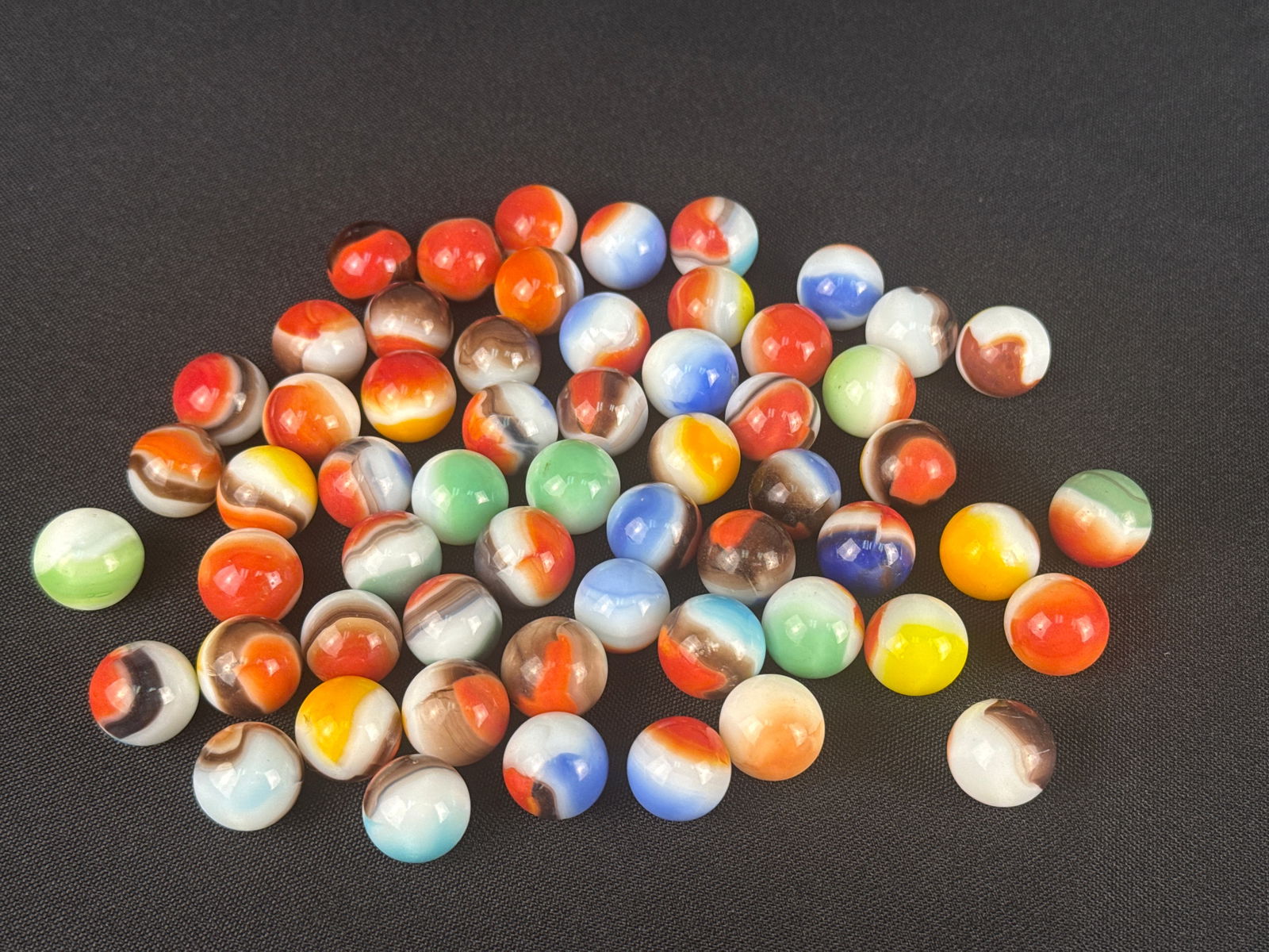 A Collection of Vitro Agate All Reds Glass Marbles (1 of 4)