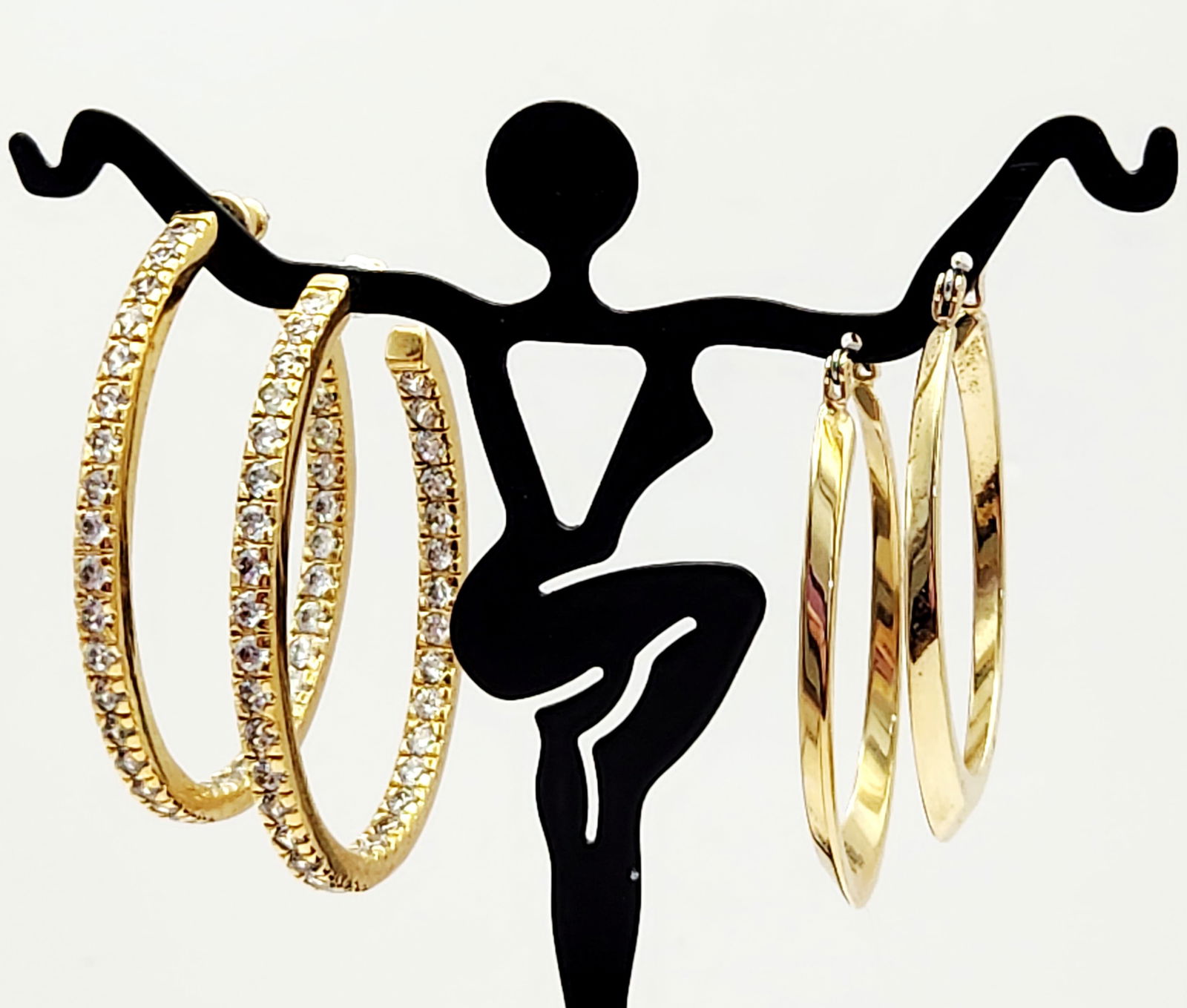 10K Gold-Plated & Gold Tone Earrings 10K 13.7: 10K gold plated & clear stones & Ralph Lauren gold-tone hoop earrings. The first pair features channel-set with colorless round-cut stones along the outer & inner circumference. The second