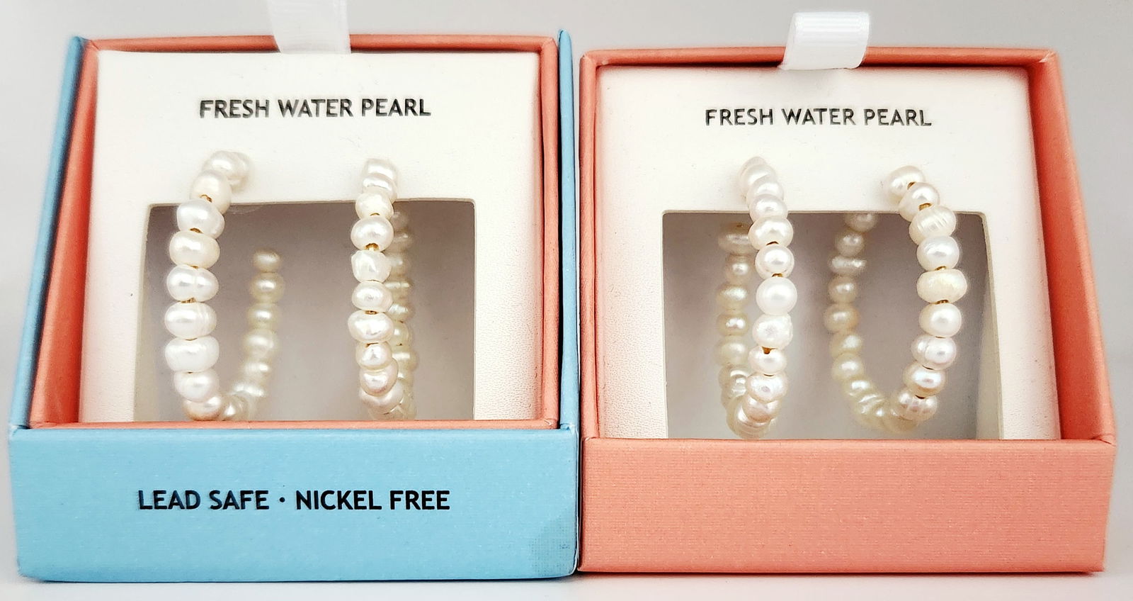 House of Harlow 1960 Freshwater Pearl Hoop Earrings: A pair of hoop earrings by House of Harlow 1960. Each earring features a series of small, lustrous white freshwater pearls of natural, slightly irregular shape. The earrings are constructed with gold-