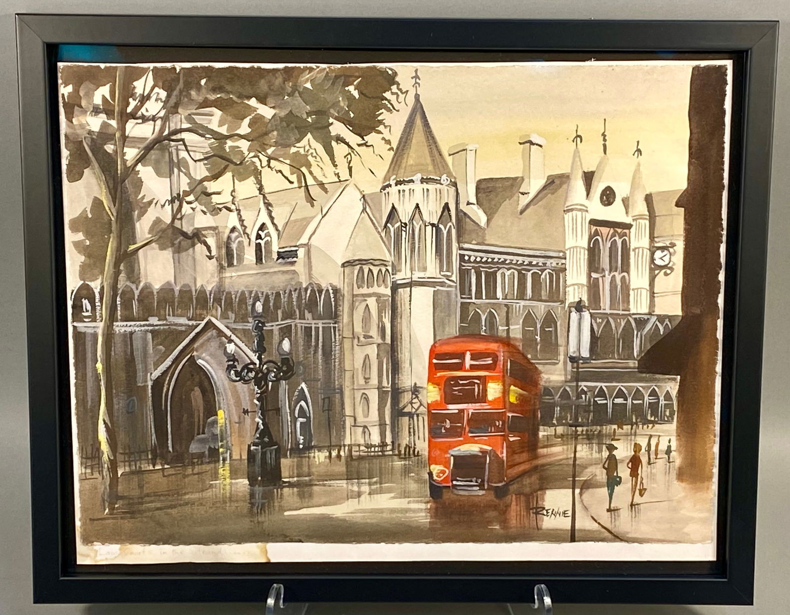A Framed Watercolor and Gouache Painting of the Royal Courts of Justice, London, Signed Rennie: This work on paper is executed in watercolor and gouache, depicting a street scene in London. The composition features the Gothic Revival architecture of the Royal Courts of Justice on the Strand, wit