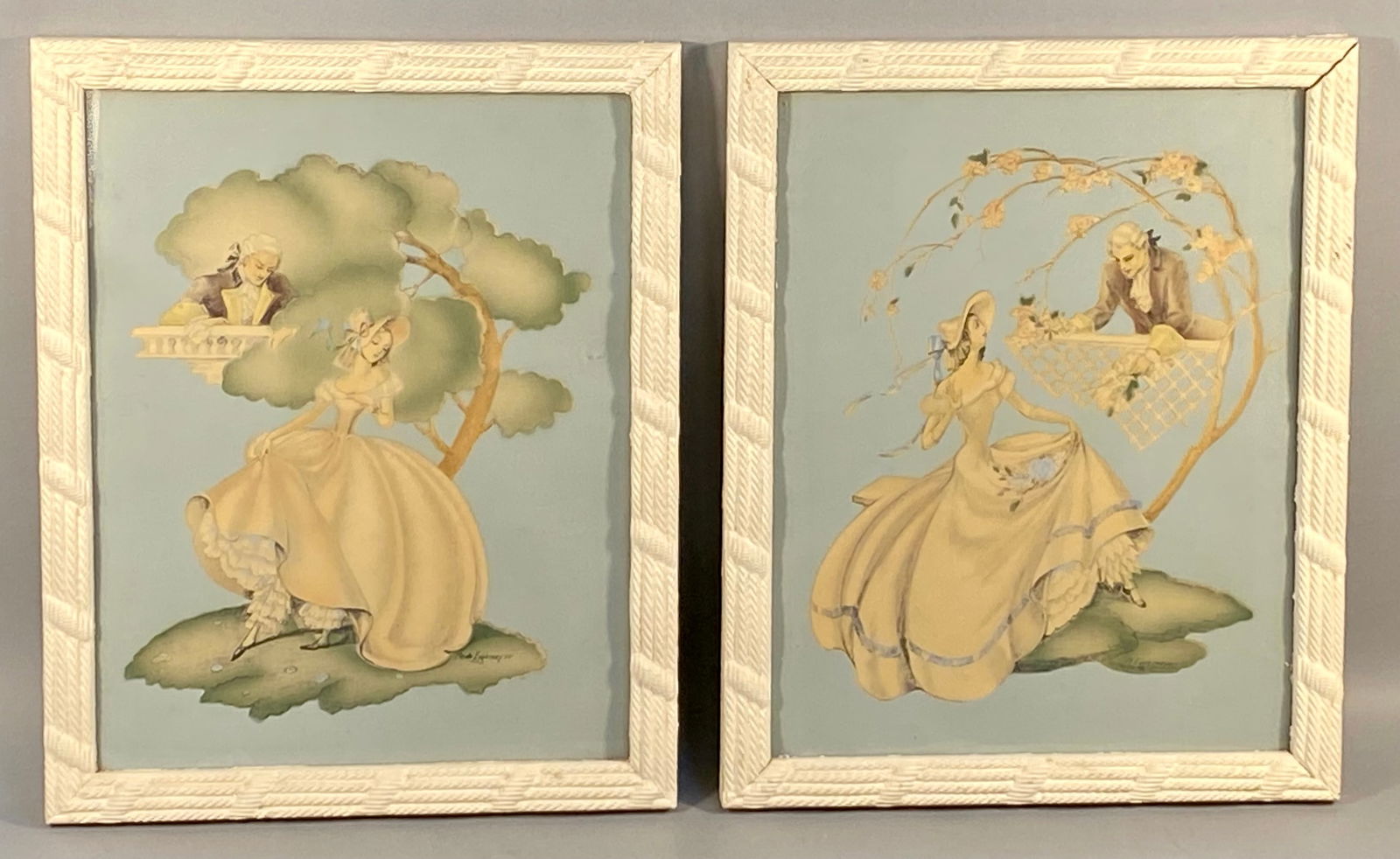 A Pair of Maude Eggemeyer Victorian Courting Scene 3D Decoupage Prints: A pair of mid-20th-century 3D decoupage or paper art prints by Maude Eggemeyer. The artworks depict stylized 18th-century romantic courting scenes featuring figures in period costume against a pale bl