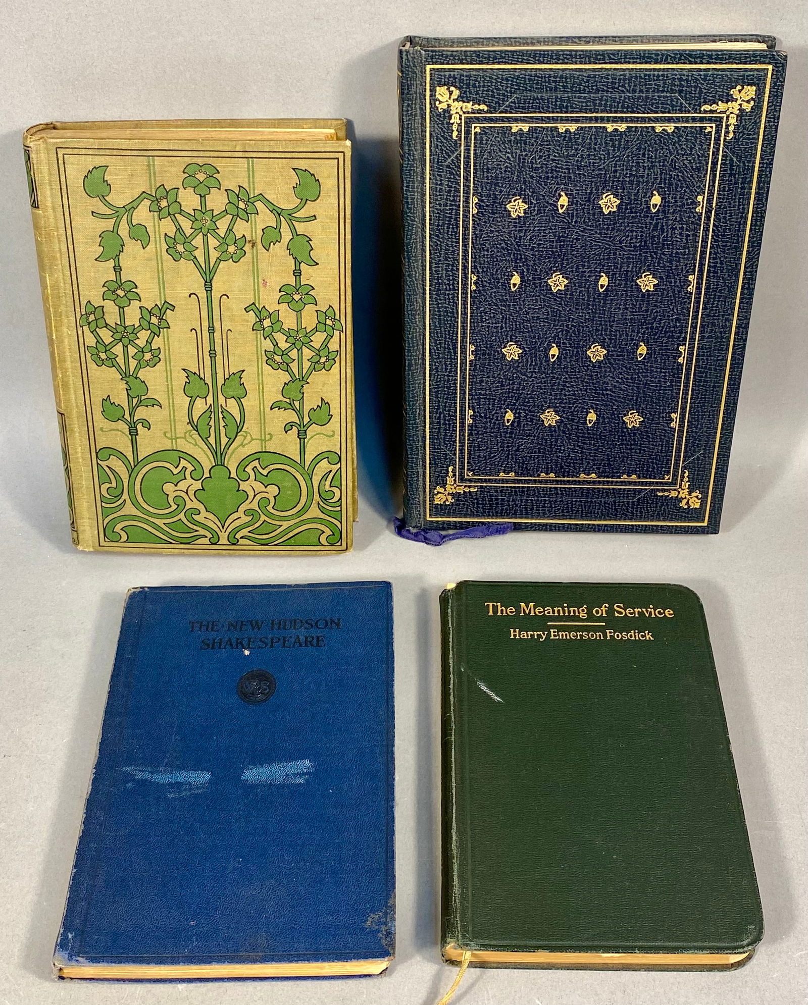 A Collection of Antique and Vintage Hardcover Literary Works: This collection of hardcover books features various literary works with decorative bindings from the early 20th century. The group includes an edition of The Tragedy of Macbeth (The New Hudson Shakesp