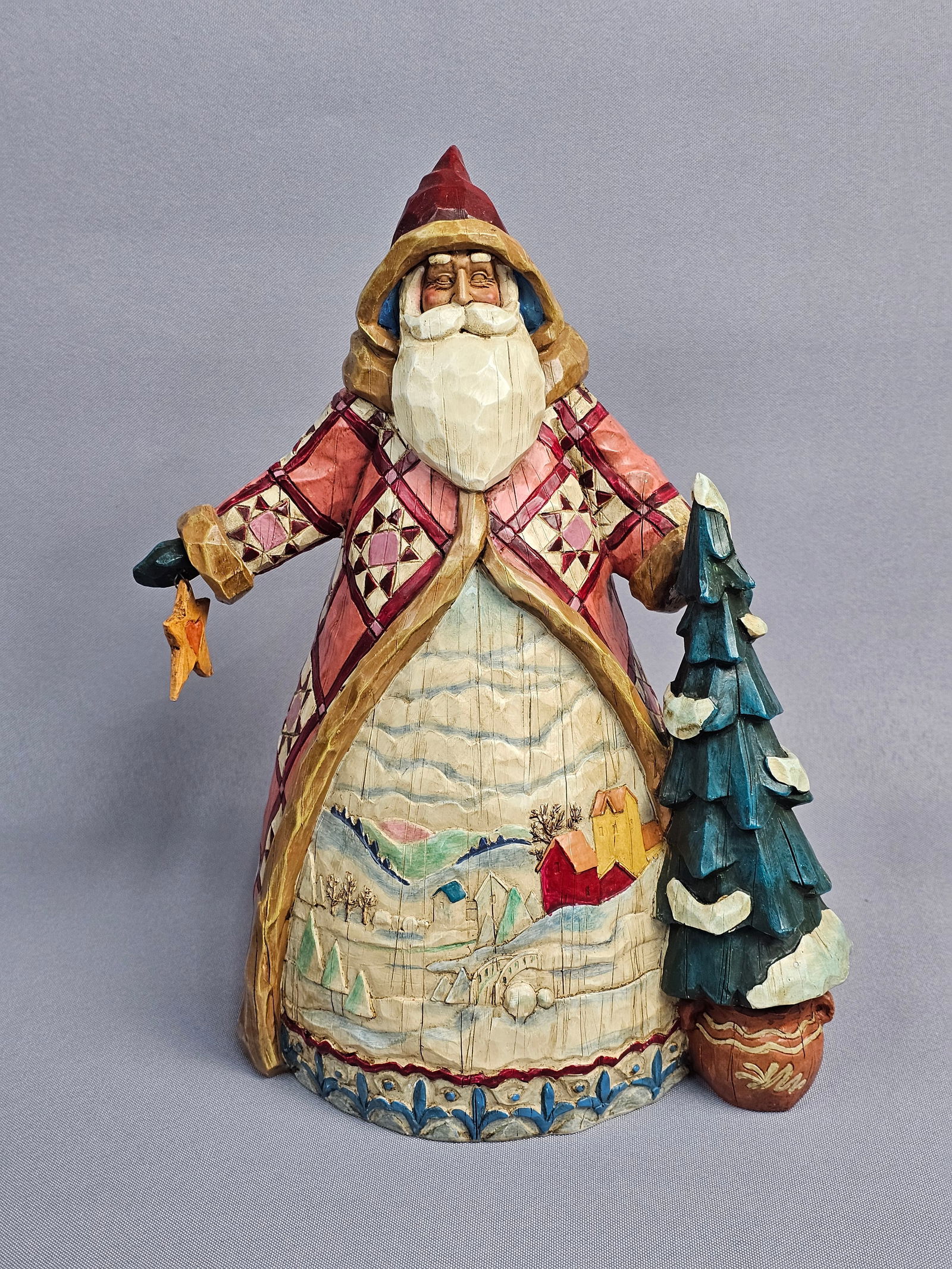 Jim Shore Heartwood Creek Dashing Through The Snow Santa Claus Figurine 2003: A resin figurine from the Heartwood Creek collection by artist Jim Shore, titled Dashing Through The Snow, item number B112237. The figure is designed with a folk art aesthetic intended to simulate