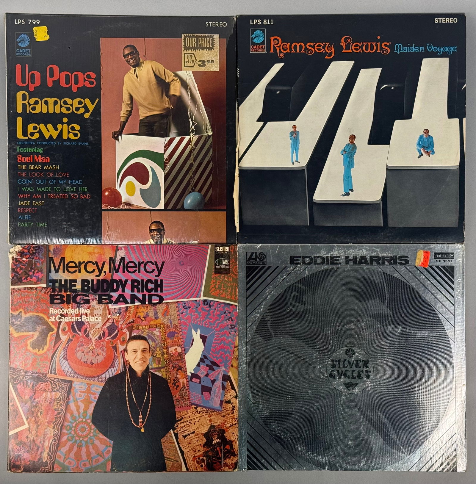 A Group of Vintage Jazz Vinyl LP Records Including Ramsey Lewis, Buddy Rich, and Eddie Harris: A group of vintage jazz vinyl LP records from the late 1960s. The collection includes Silver Cycles by Eddie Harris (Atlantic SD 1517), Up Pops Ramsey Lewis (Cadet LPS 799), Maiden Voyage by Ramsey Le