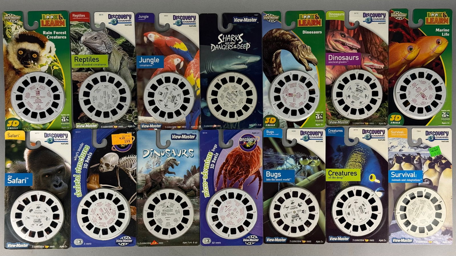 A Collection of View-Master Discovery Channel and Look & Learn 3D Reel Packs: A collection of View-Master 3D reel packs featuring educational nature and wildlife themes from the Discovery Channel, Discovery Kids, and Look & Learn series. Each unit is composed of three colle