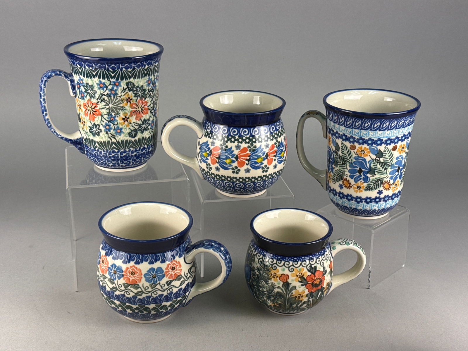 A Group of Blue Rose Polish Pottery Mugs (1 of 5)