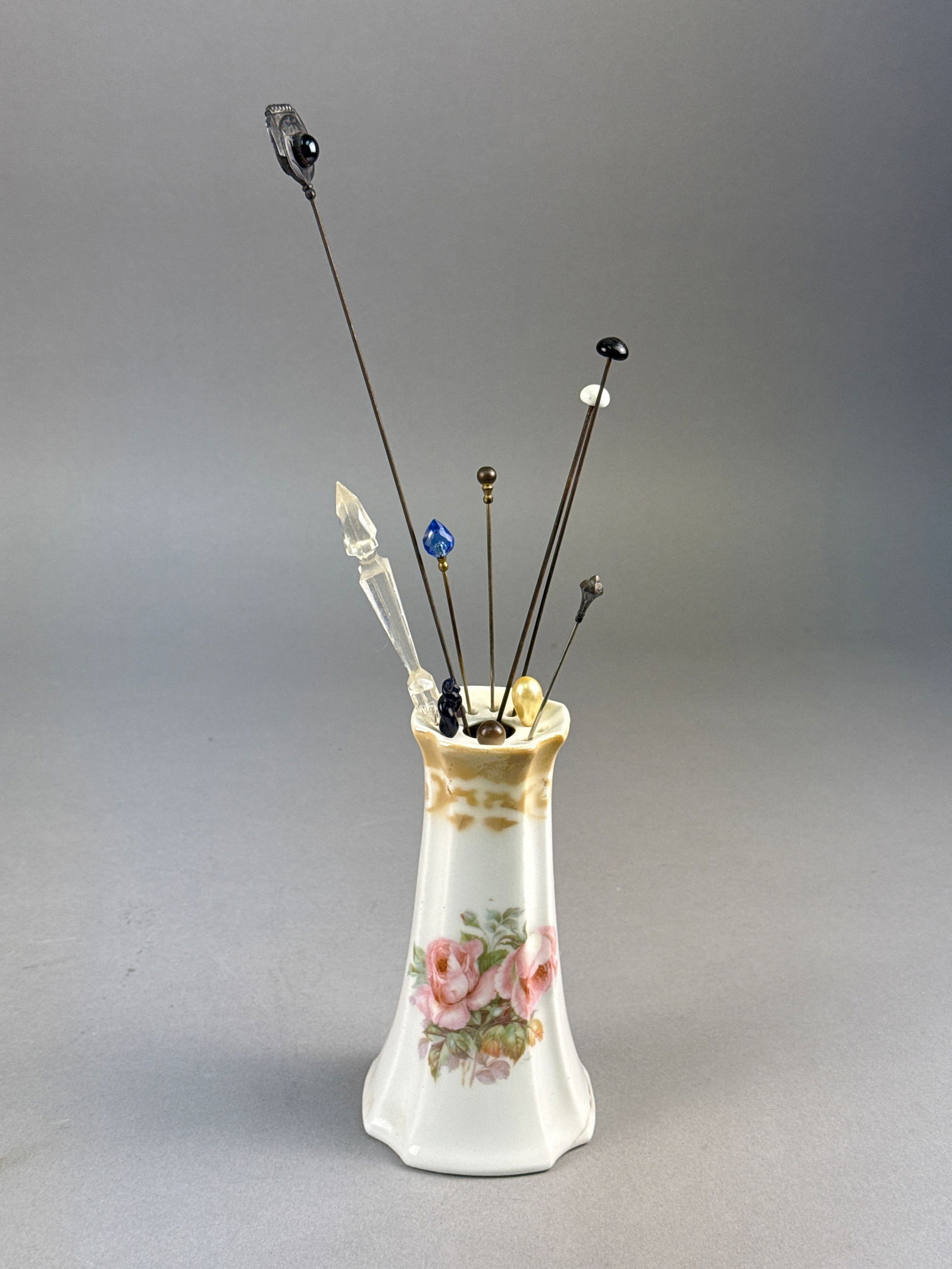 A Collection of Antique Style Hatpins and a Porcelain Hatpin Holder (1 of 4)