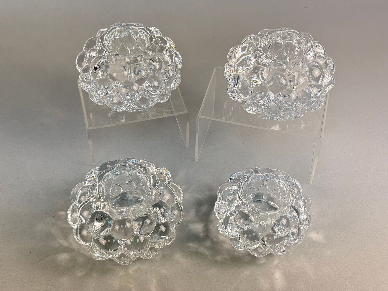 A Collection of Orrefors Raspberry Crystal Votive Candle Holders (1 of 8)