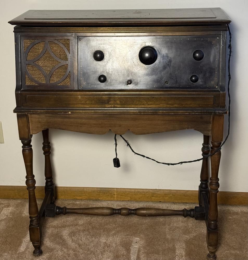 Day-Fan Electric Company Type 5057 Console Radio in Shaw-Walker Cabinet: This item is located on the second floor. Day-Fan Electric Company console radio, type 5057, serial number 4644. The unit is housed in a dark wood cabinet manufactured by Shaw-Walker of Dayton, Ohio,