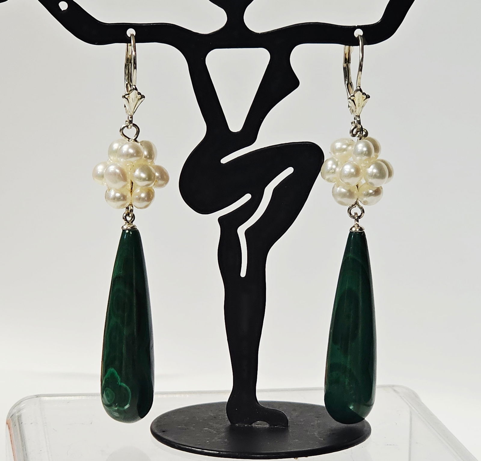 Sterling Malachite & Pearl Cluster Earrings 14.3 Grams: This pair of drop earrings is constructed from sterling silver and features elongated teardrop-shaped pendants that appear to be green malachite. The stones exhibit characteristic dark and light green