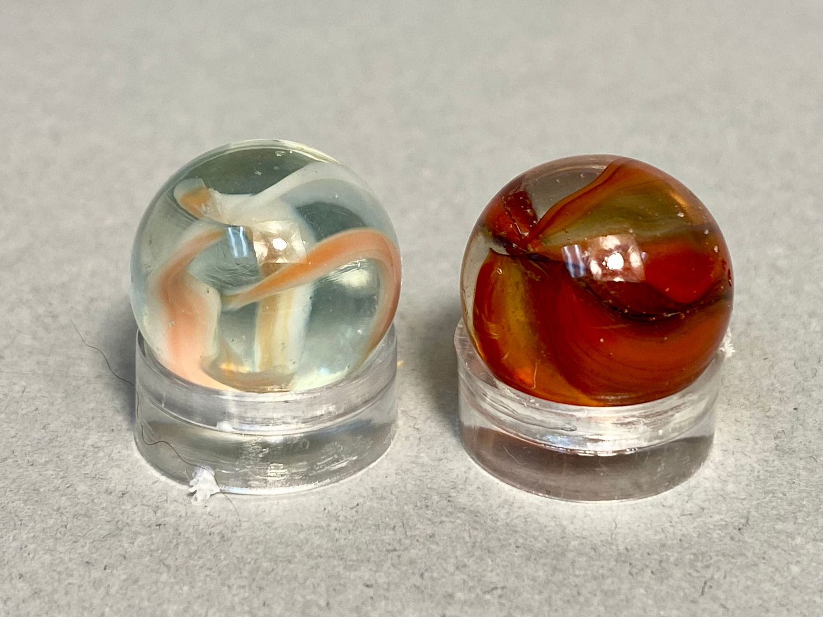 A Pair of Vitro Agate Company Cat's Eye Glass Marbles, Hybrid and Root Beer Patterns, circa (1 of 4)