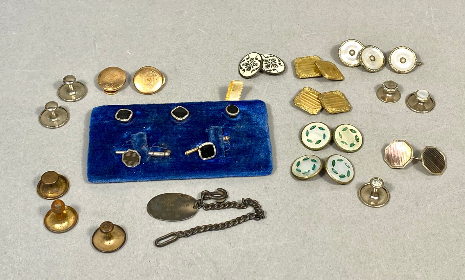 Gentleman's Dress Jewelry Collection, Larter & Sons: This collection of gentleman's dress jewelry features a variety of Art Deco and mid-century accessories. The primary highlight is a set of three shirt studs by Larter & Sons, featuring circular bl