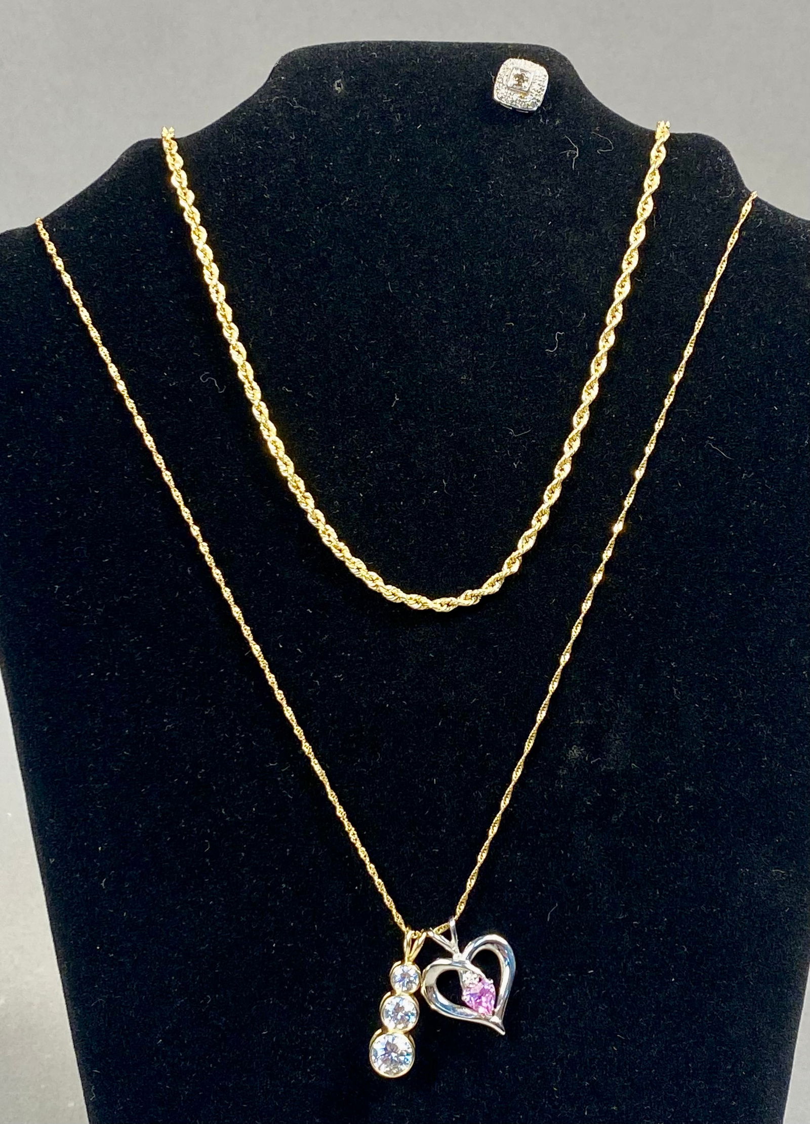 Three Pieces of 14 Karat Gold Jewelry Including Gemstone Pendant Necklaces and a Single Stud (1 of 14)