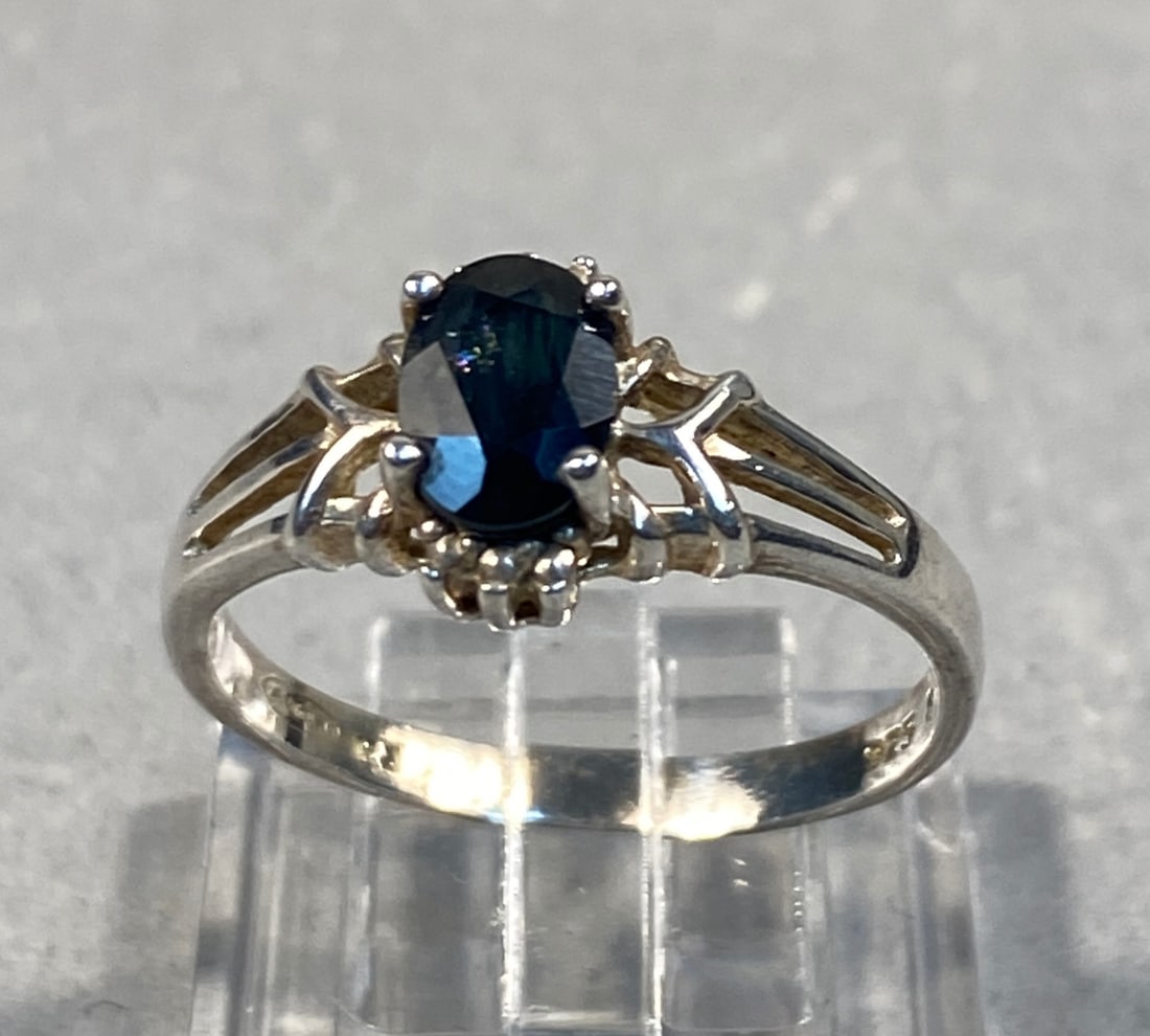 Sterling Silver Ring Featuring an Oval Blue Gemstone and Colorless Accents 2.3g (1 of 5)