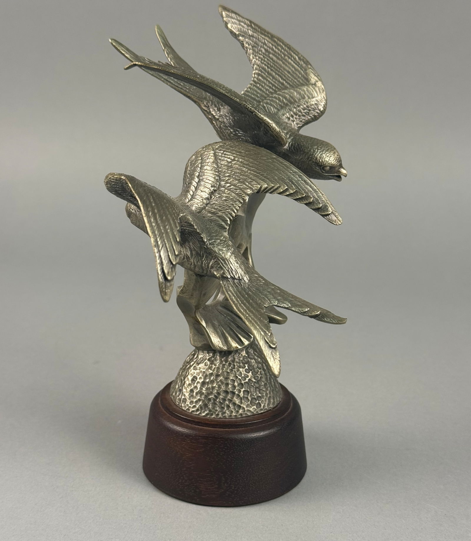 Irving Burgues for Lance Fine Pewter Barn Swallows Sculpture, 1976: An Irving Burgues for Lance Fine Pewter limited edition sculpture titled Barn Swallows. The piece is cast in silver-toned pewter and depicts two birds in flight with detailed feathering. The birds are