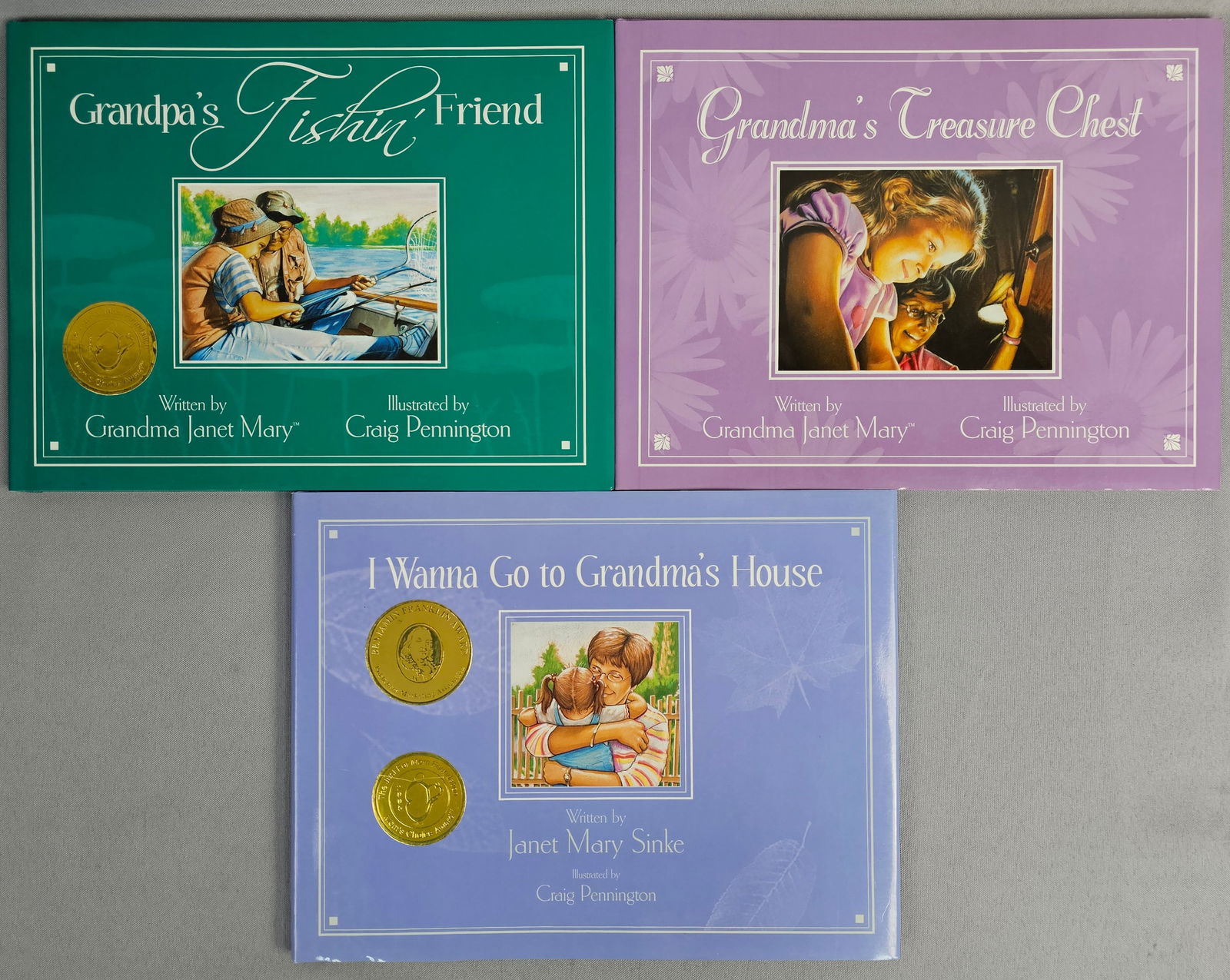 Three Signed Volumes from the Grandma Janet Mary Series: The collection includes: 1. Grandma's Treasure Chest. 2005. Stated First Edition. 4th book in the series. ISBN 0-9742732-3-6. Inscribed by the author on the title page: To Grandma Katie, with love, Gr